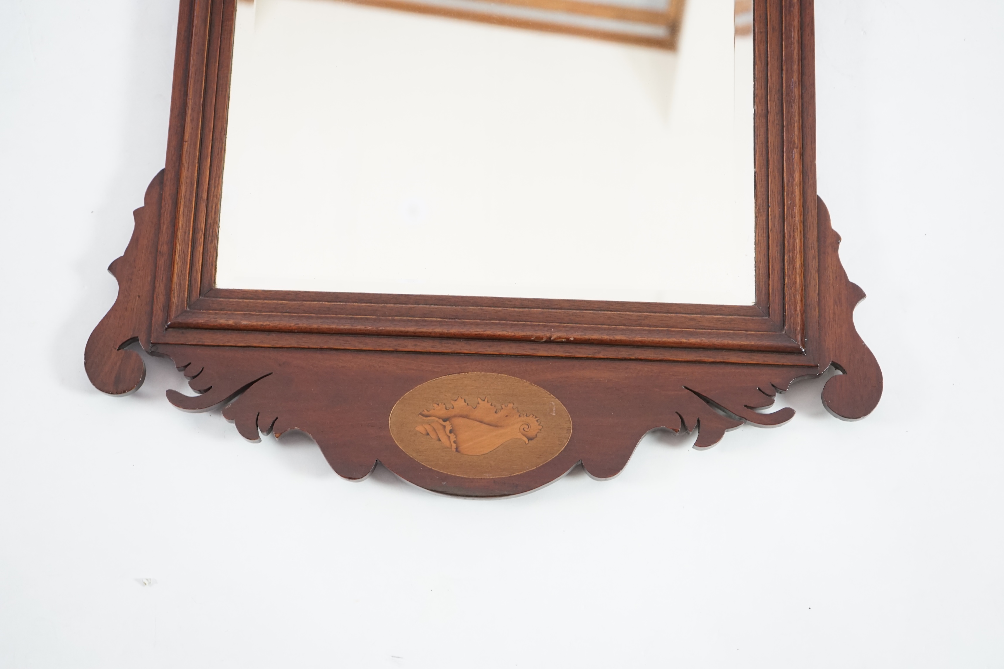 A Georgian style mahogany fret frame wall mirror